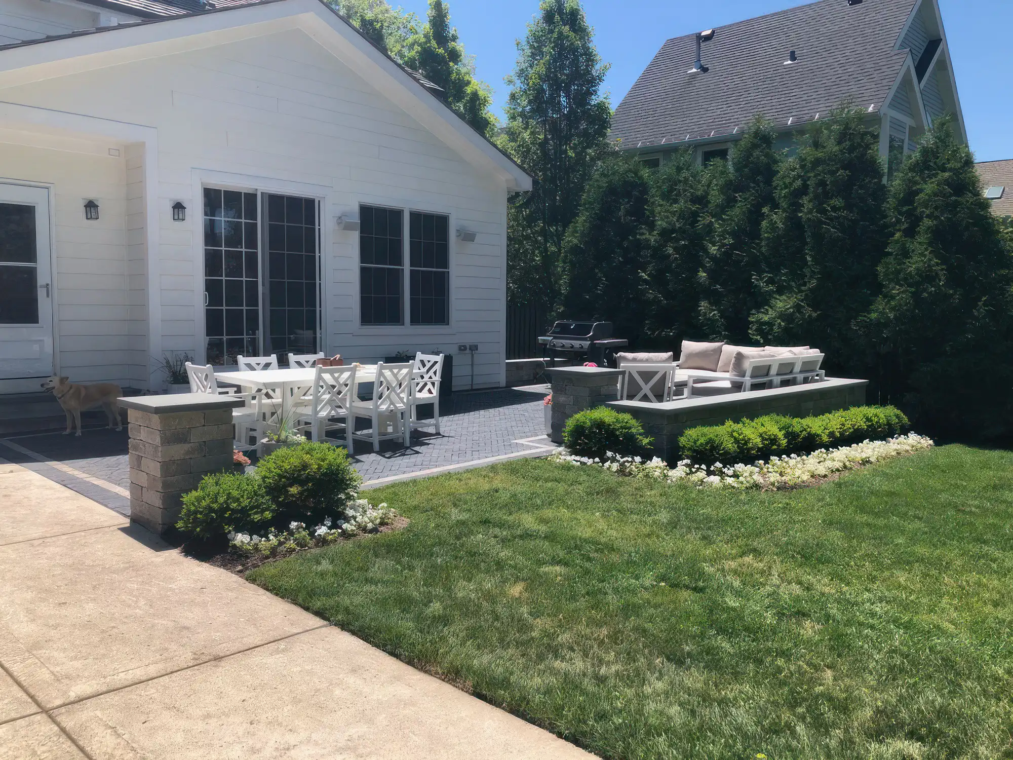 Retaining wall and plant design at end of patio