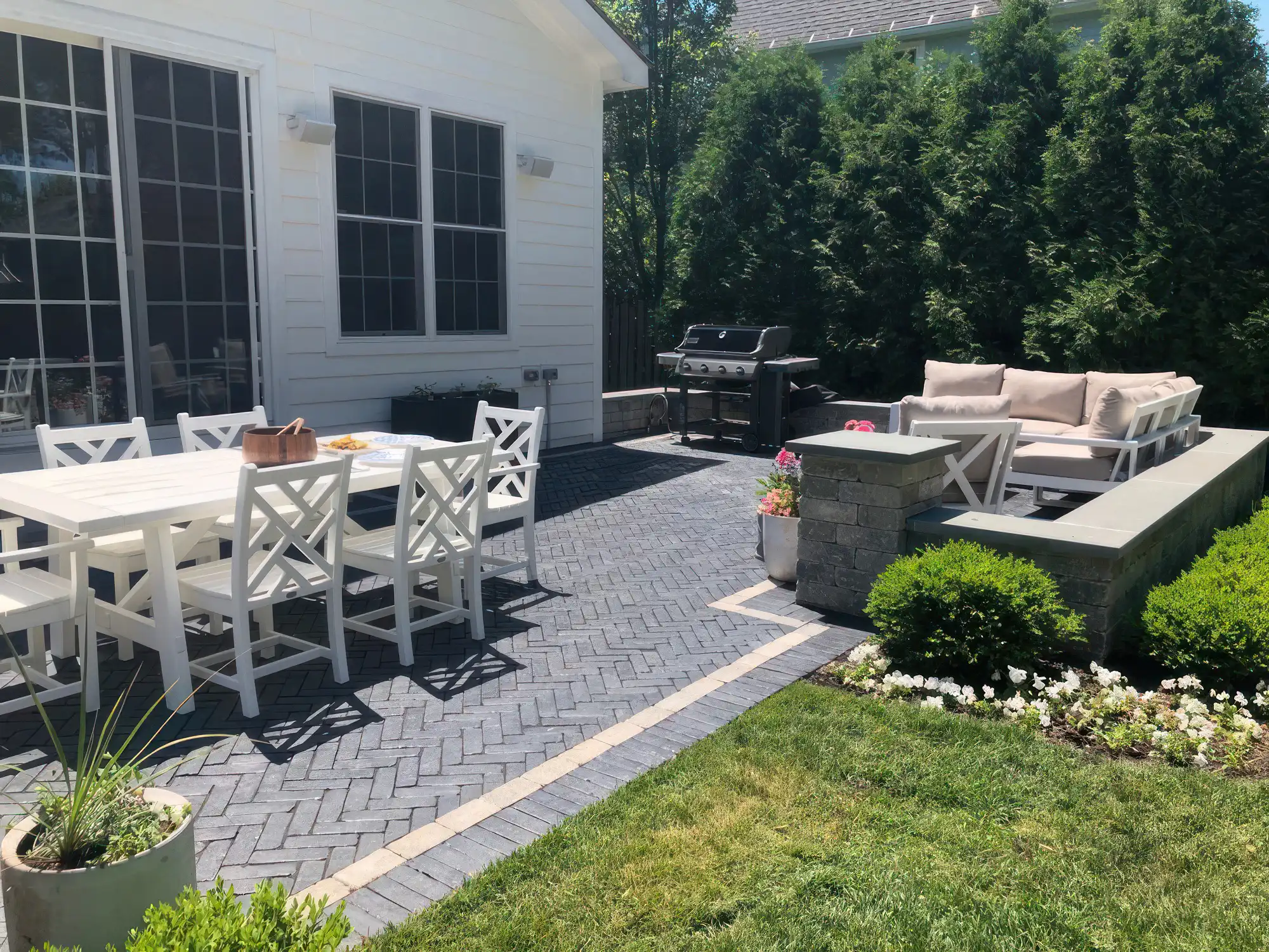Full view of patio, retaining wall and plant design