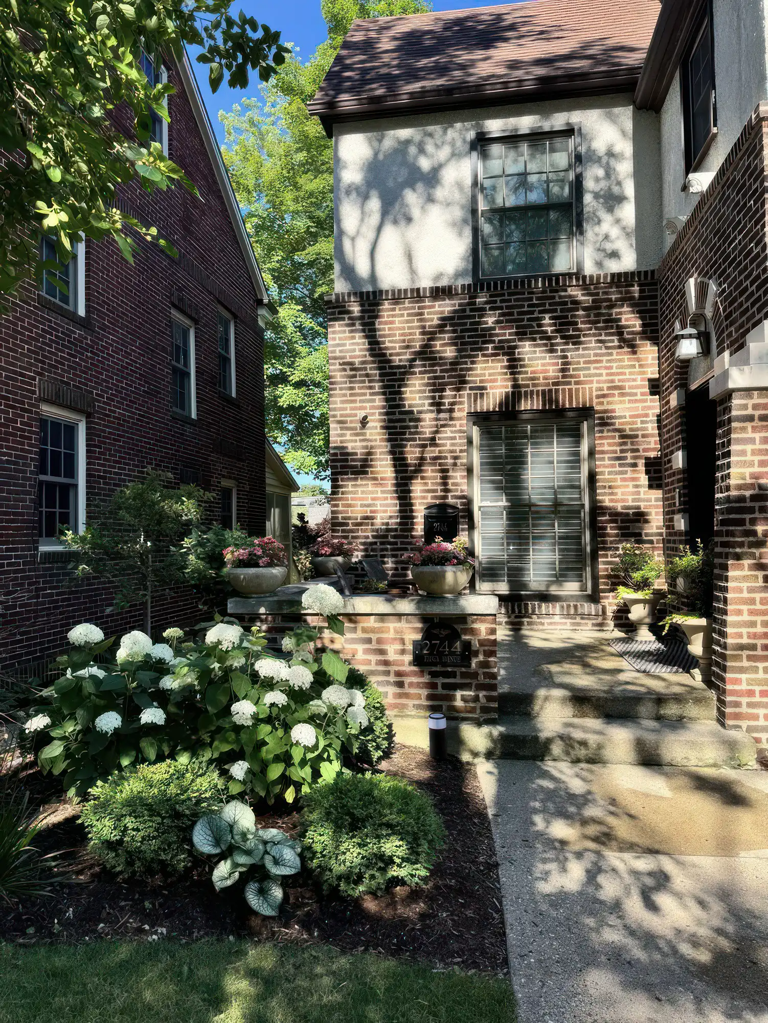 Closeup of plants in sculptured entry