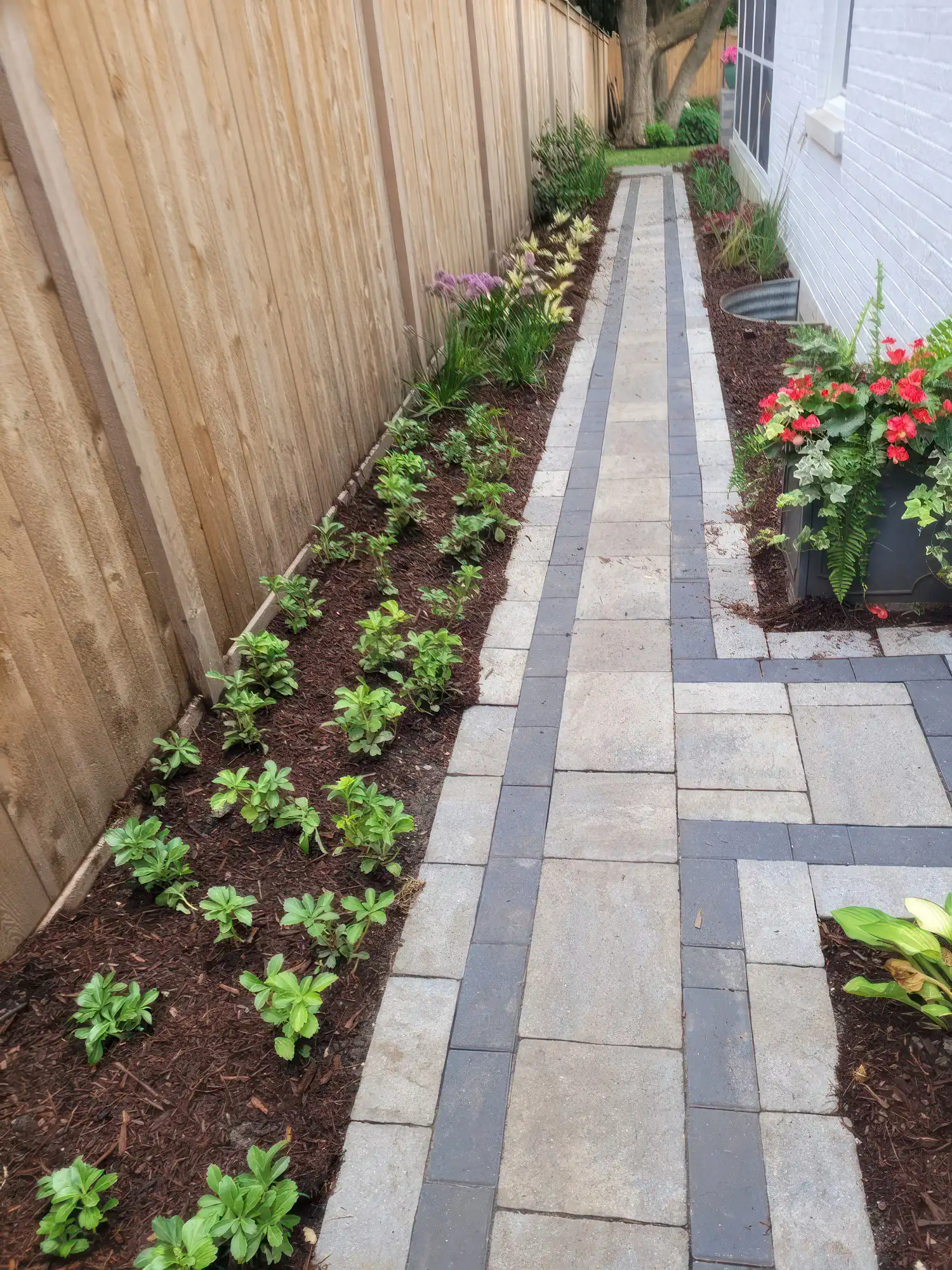 multi-colored irregular patterned brick walkway of various sizes