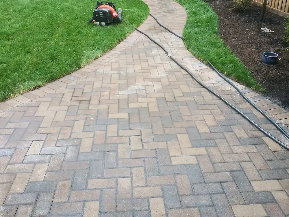 beautiful curved patio stonework with geometric pattern