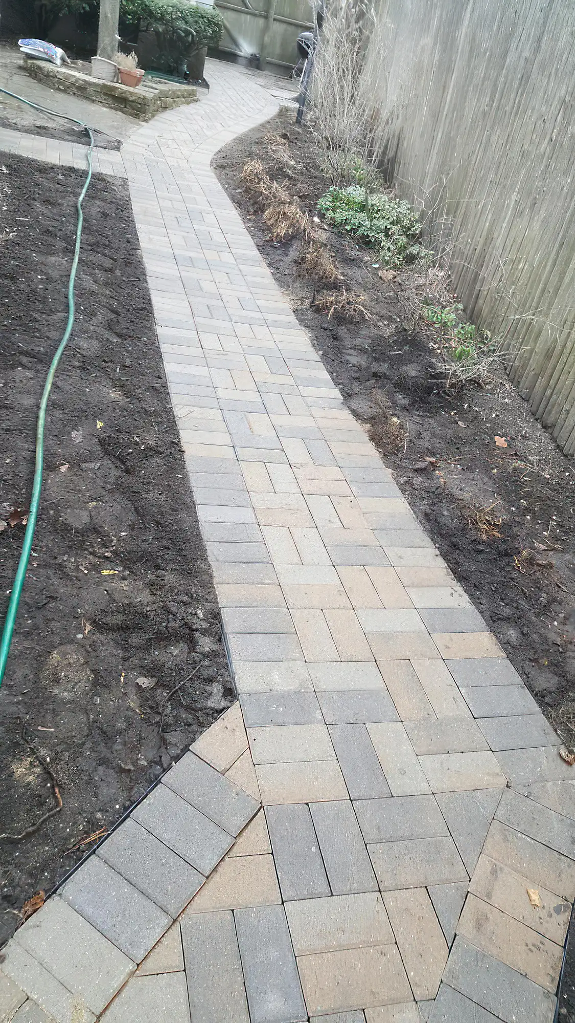 multi-colored irregular patterned brick walkway