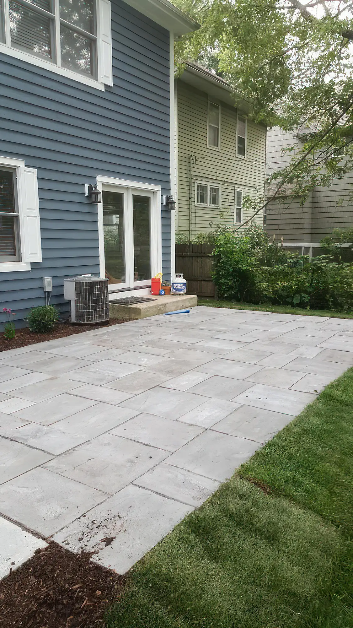 progress on a bright stone patio