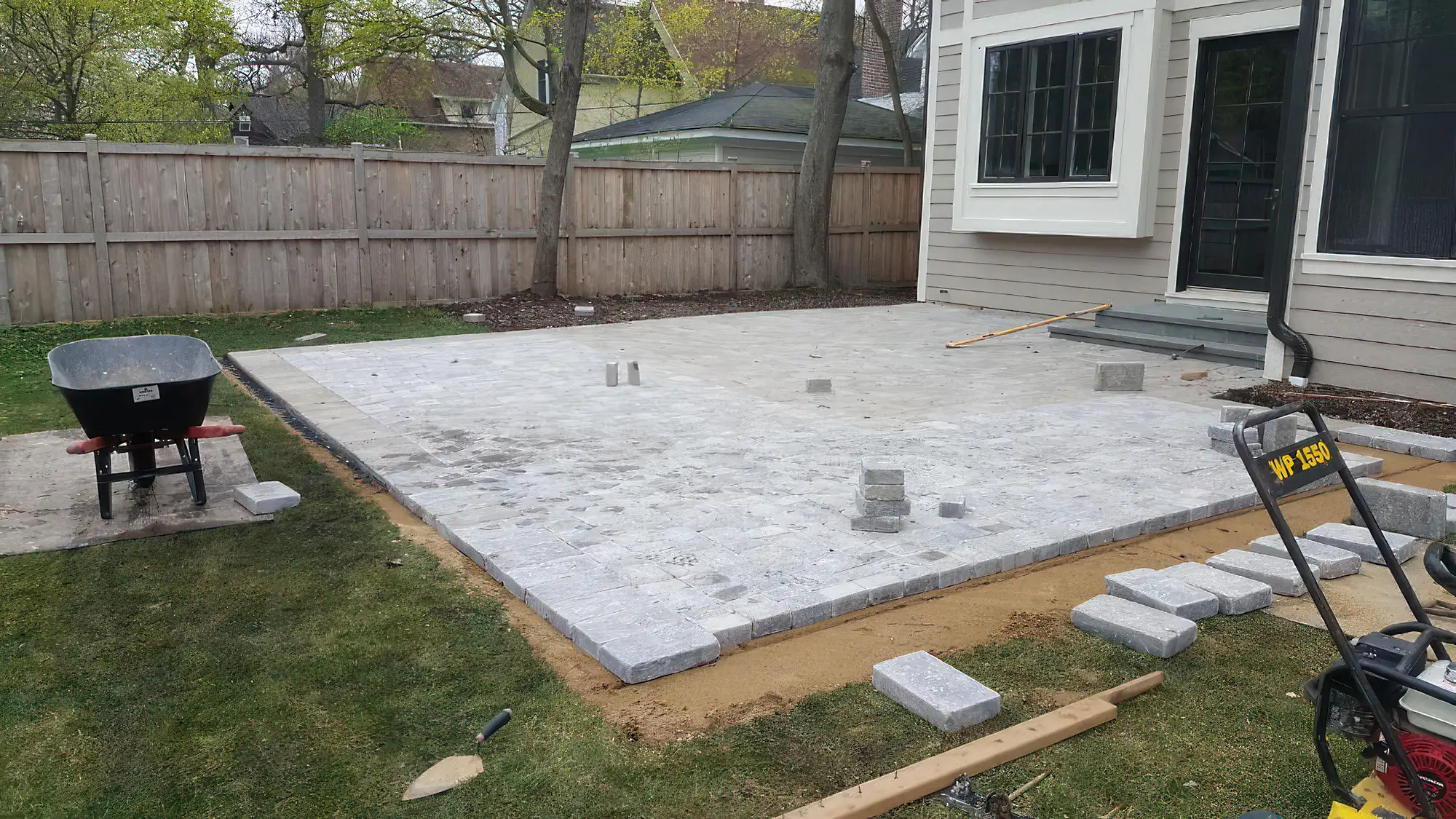 progress on a bright stone patio